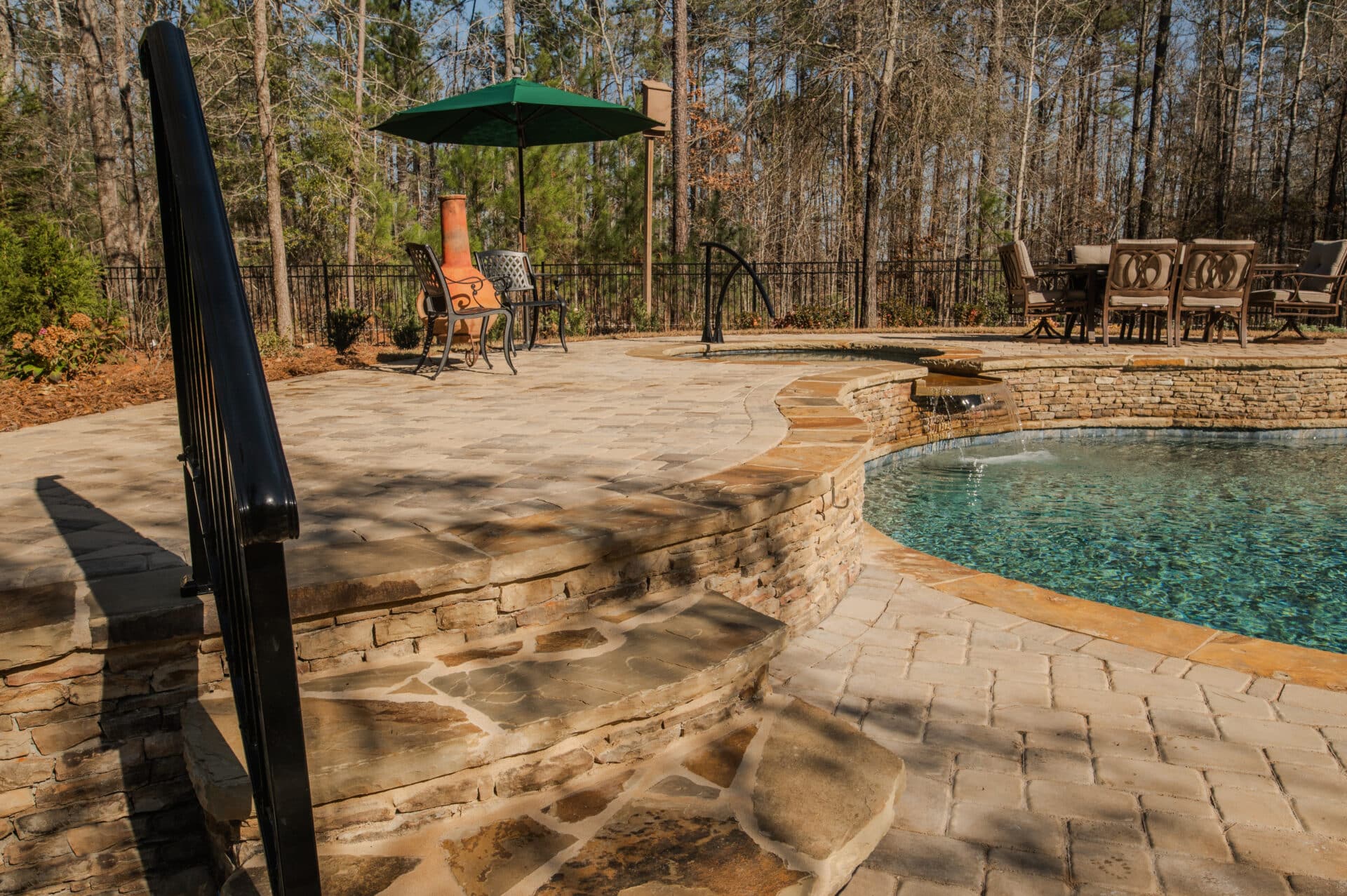 outdoor pool project with custom deck and stairs