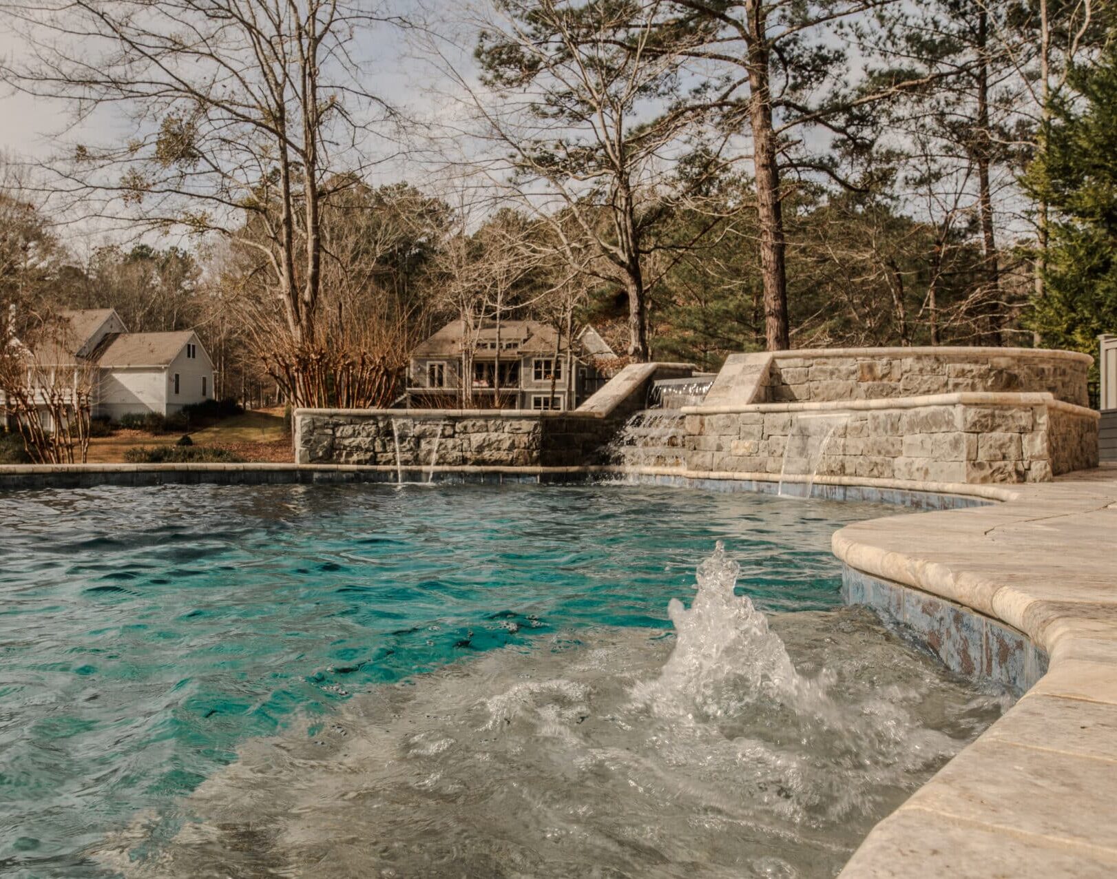 Lake Country Pools project with hot tub & waterfalls