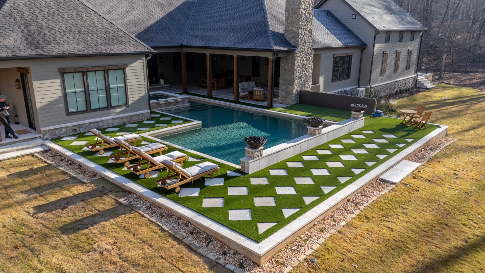 lake country pools project with hot tub, waterfalls, fire features, and turf