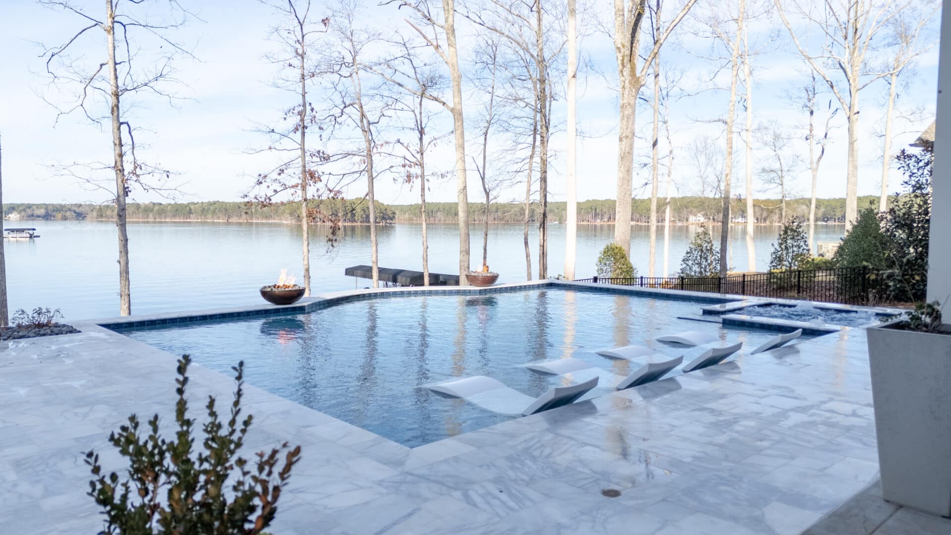 Lake Country Pools project with hot tub, waterfalls, and fire features